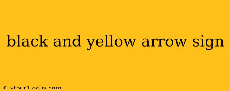 black and yellow arrow sign