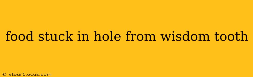 food stuck in hole from wisdom tooth