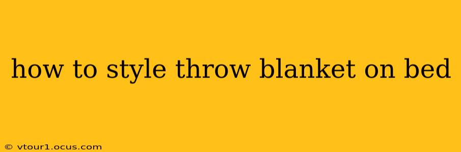 how to style throw blanket on bed