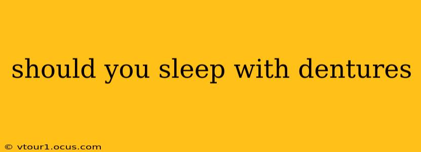 should you sleep with dentures