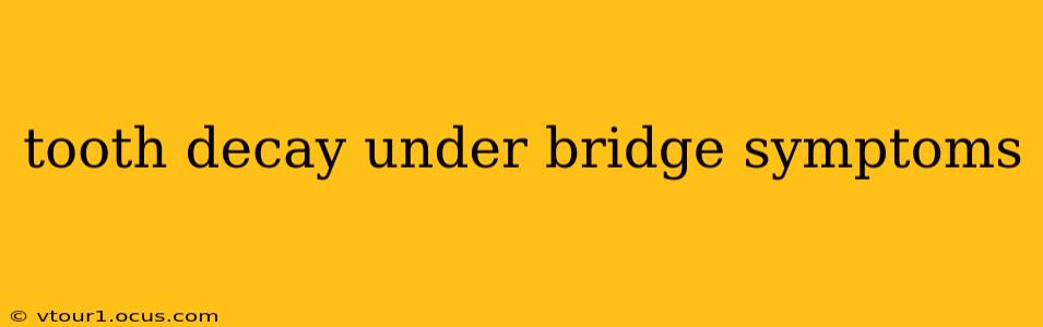 tooth decay under bridge symptoms